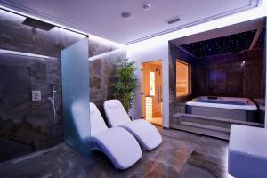 Posteľ alebo postele v izbe v ubytovaní Hotel Kocka Vrnjačka Banja