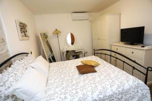Posteľ alebo postele v izbe v ubytovaní Apartment ARCHIE