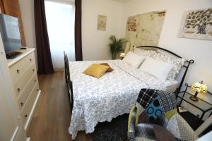 Posteľ alebo postele v izbe v ubytovaní Apartment ARCHIE