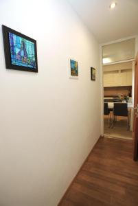 Televízia a/alebo spoločenská miestnosť v ubytovaní Apartment ARCHIE