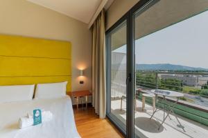 Balkón nebo terasa v ubytování B&B HOTEL Pisa Airport