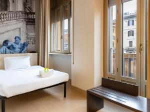 Postel nebo postele na pokoji v ubytování B&B Hotel Roma Trastevere + 26 fotografií