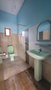 Koupelna v ubytování Thomasha Homestay Wellawaya