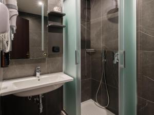 Koupelna v ubytování B&B Hotel Faenza