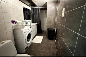 Ένα μπάνιο στο Cozy Central Apartment- Pulpit-R