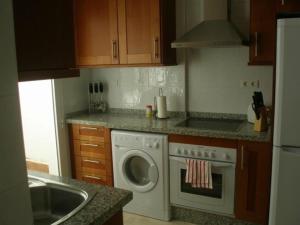 Kuchyň nebo kuchyňský kout v ubytování Duplex Apartment with stunning Sea Views