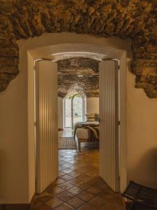 Posteľ alebo postele v izbe v ubytovaní Deco - Casa Voltes Peratallada