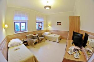 Postel nebo postele na pokoji v ubytování Sanatorium Mewa + 28 fotografií