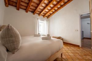 Posteľ alebo postele v izbe v ubytovaní Deco - Casa Voltes Peratallada