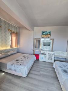 Postel nebo postele na pokoji v ubytování Diamant Otel