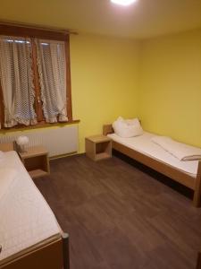 Postel nebo postele na pokoji v ubytování Ferienstudio Wenz C