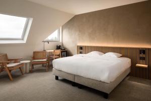 Postel nebo postele na pokoji v ubytování Hotel Chamade