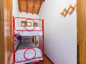 A bed or beds in a room at Apartment Certina 4 by Interhome
