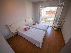 Katil atau katil-katil dalam bilik di Holiday Home Résidence Indigo II-2 by Interhome