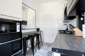 Kuchyňa alebo kuchynka v ubytovaní Standard Apartment by Hi5 - Rákóczi 23 Studio