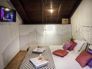 Televízia a/alebo spoločenská miestnosť v ubytovaní Holiday Home N&M by Interhome