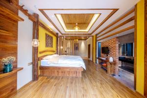 Hongfu Villa - Zhangjiajie National Forest Park West Gate客房内的一张或多张床位