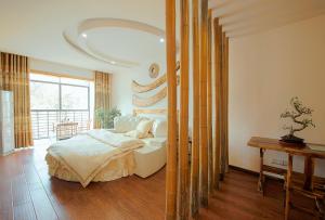 Hongfu Villa - Zhangjiajie National Forest Park West Gate客房内的一张或多张床位