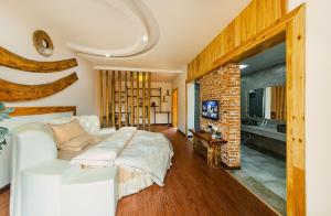 Hongfu Villa - Zhangjiajie National Forest Park West Gate的电视和/或娱乐中心