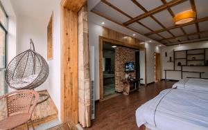 Hongfu Villa - Zhangjiajie National Forest Park West Gate客房内的一张或多张床位