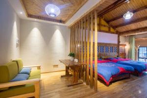Hongfu Villa - Zhangjiajie National Forest Park West Gate客房内的一张或多张床位