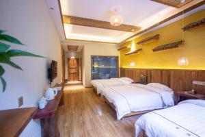 Hongfu Villa - Zhangjiajie National Forest Park West Gate客房内的一张或多张床位