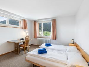 Postel nebo postele na pokoji v ubytování Apartment Parkareal - Utoring-49 by Interhome