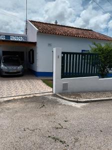 a car parked in front of a house at Casa marreiros in Aljezur +11 photos
