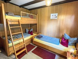 Ένα ή περισσότερα κρεβάτια σε δωμάτιο στο Apartment Am Hohen Bogen-48 by Interhome