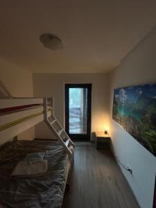 Postel nebo postele na pokoji v ubytování Kuky's Val di Sole Retreat