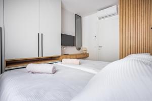 Krevet ili kreveti u jedinici u objektu Borik Residence 2024