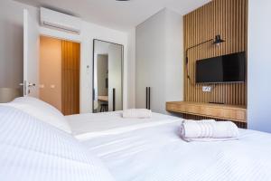 Krevet ili kreveti u jedinici u objektu Borik Residence 2024