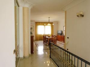 a living room with a table and a dining room at Villa Incoronata by Interhome in Nardò +53 photos