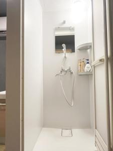 Koupelna v ubytování Hananosato Hotel 池袋本店