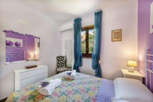 Posteľ alebo postele v izbe v ubytovaní Casa Vacanza Villa Aurora + 37 fotografií