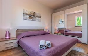 Postel nebo postele na pokoji v ubytování Three-Bedroom Apartment In Barban