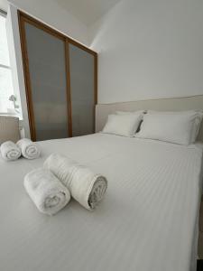 Postel nebo postele na pokoji v ubytování Possidi Hiliadou Boutique Resort