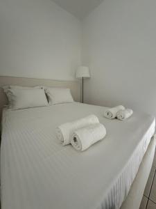 Postel nebo postele na pokoji v ubytování Possidi Hiliadou Boutique Resort