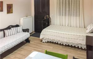 Postel nebo postele na pokoji v ubytování Apartment Leventoxori Ilias With Sea View 06