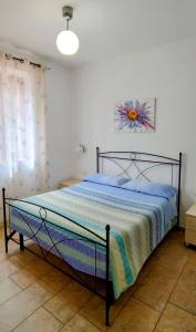 Posteľ alebo postele v izbe v ubytovaní B&B Vetralla