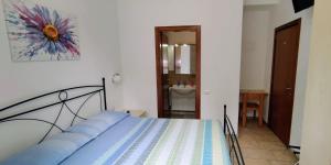 Posteľ alebo postele v izbe v ubytovaní B&B Vetralla