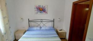 Posteľ alebo postele v izbe v ubytovaní B&B Vetralla