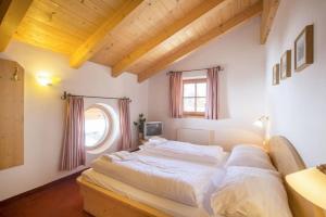 Voodi või voodid majutusasutuse Schöneben Chalet Hohe Tauern Blick toas +35 fotot