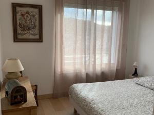 Postel nebo postele na pokoji v ubytování T4 VUE IMPRENABLE montagnes et ville