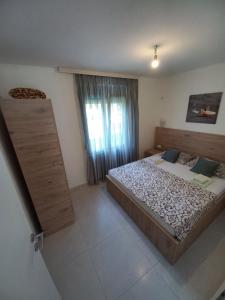 Postel nebo postele na pokoji v ubytování NanaDea 3