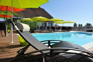 Πισίνα στο ή κοντά στο Brit Hotel Dijon Hermes
