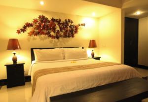 Ένα ή περισσότερα κρεβάτια σε δωμάτιο στο Kubu Soca Villa