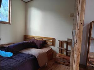 Postel nebo postele na pokoji v ubytování Batur Twin house
