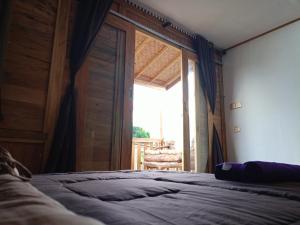 Postel nebo postele na pokoji v ubytování Batur Twin house