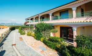 a building with a walkway in front of it at Villarios Castello in Villarios